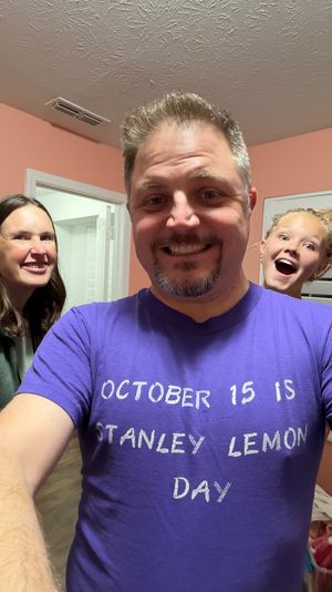 Stan Lemon wearing his October 15th is Stanley Lemon Day shirt with cameos from Sara and Lucy